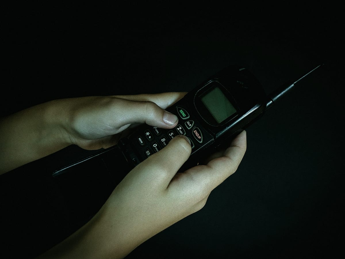 A desk phone being configured during a telephony rollout
